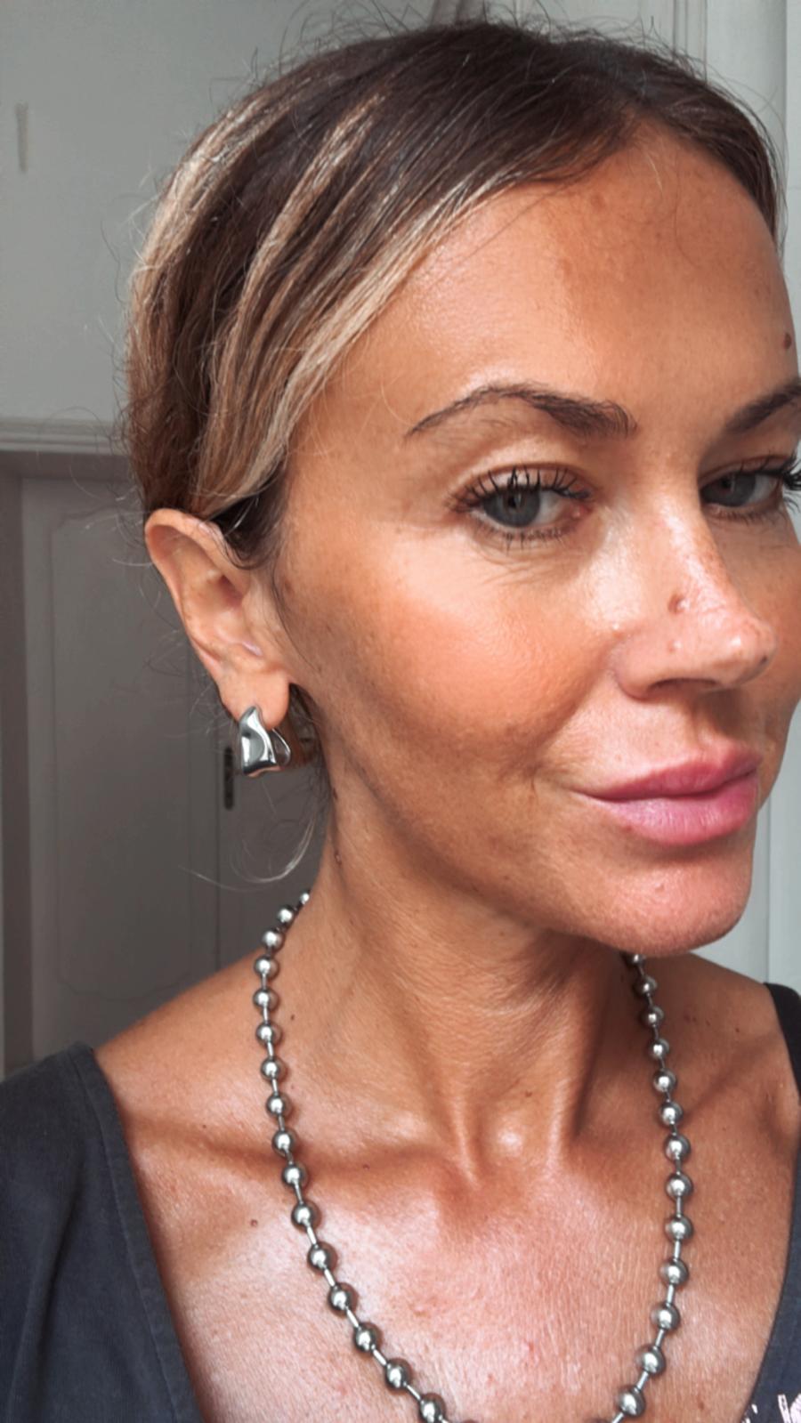 Orecchini in acciaio inossidabile e zirconi anallergici e waterproof "Liquid"