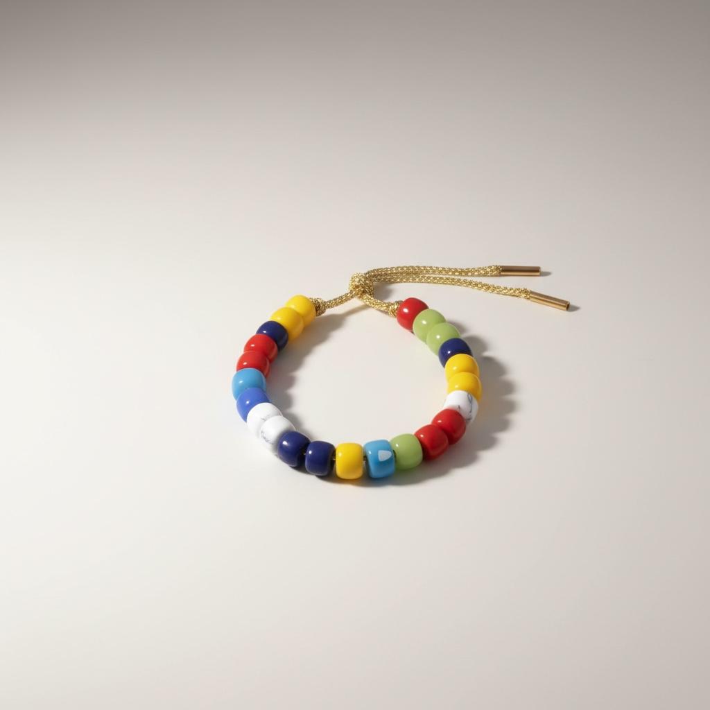 Bracciale con perle di pietra dura, vetro e cordino in lurex "Gioia"