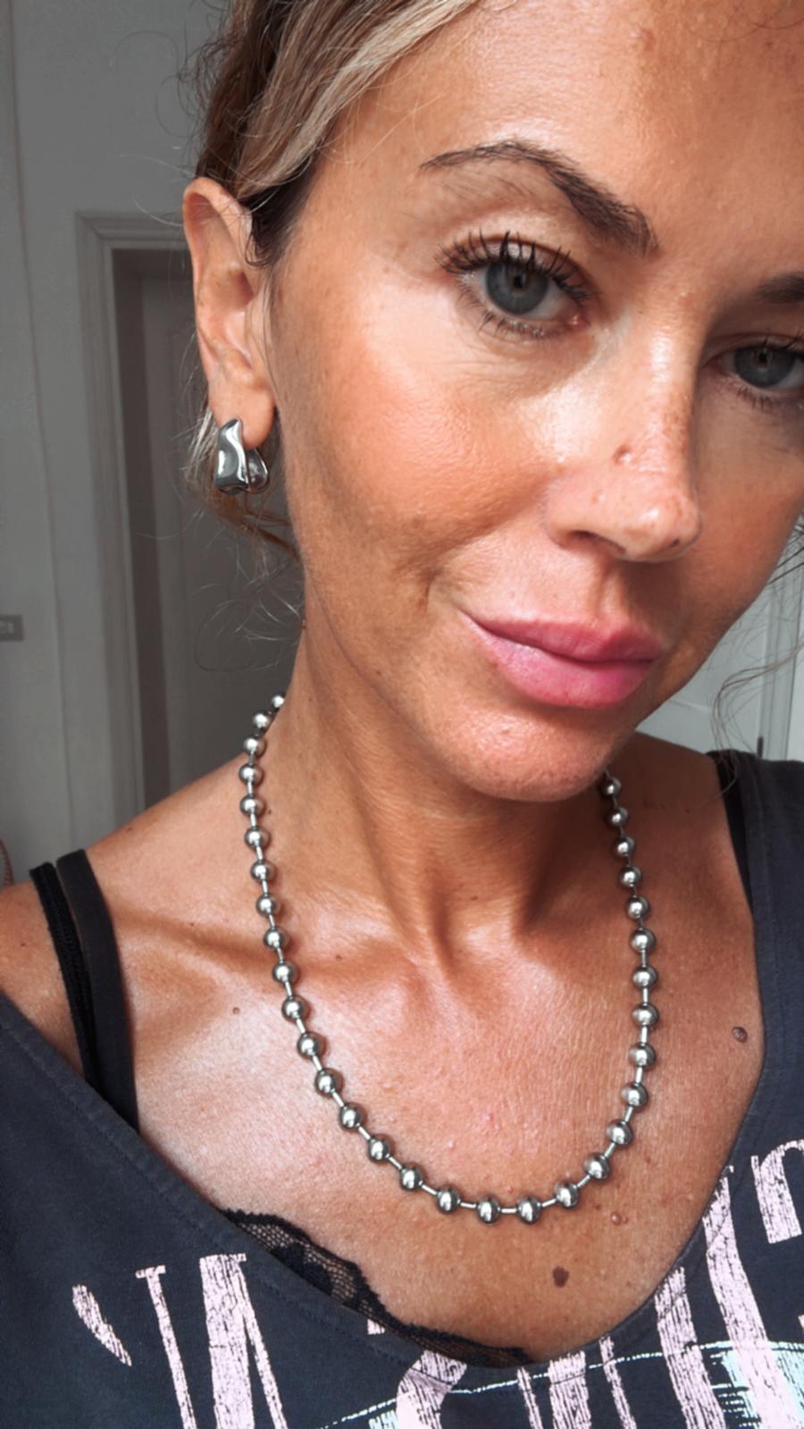 Orecchini in acciaio inossidabile e zirconi anallergici e waterproof "Liquid"