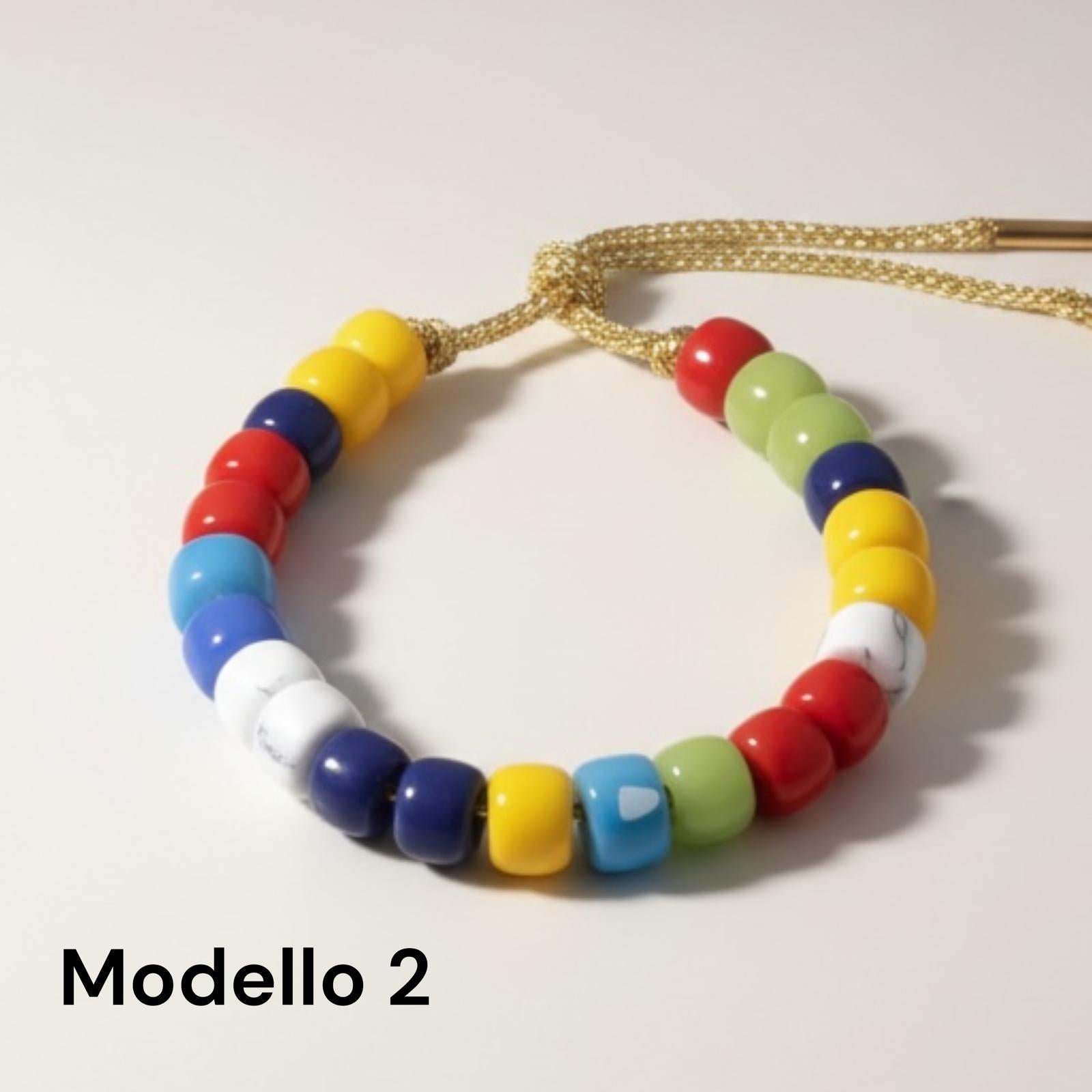 Bracciale con perle di pietra dura, vetro e cordino in lurex "Gioia"